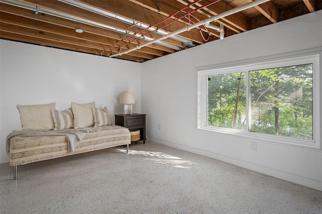 1594 Rue Calais, Bonne Terre, MO 63628 - sitting room with speckled floor and baseboards