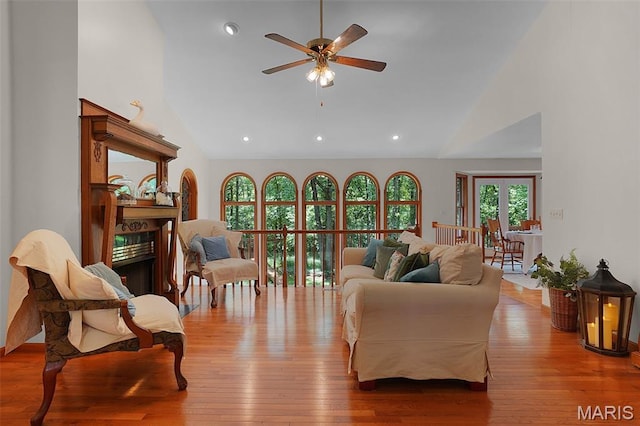 238 Skyway Dr, New Haven, MO 63068 - living room featuring high vaulted ceiling, a ceiling fan, a fireplace, hardwood / wood-style floors, and recessed lighting