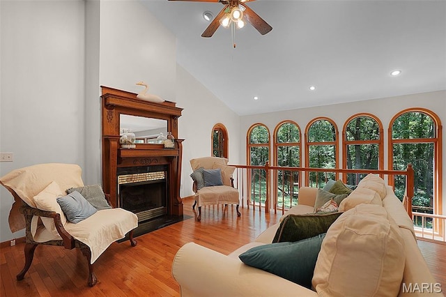 238 Skyway Dr, New Haven, MO 63068 - living area featuring a ceiling fan, wood finished floors, plenty of natural light, a fireplace with flush hearth, and recessed lighting