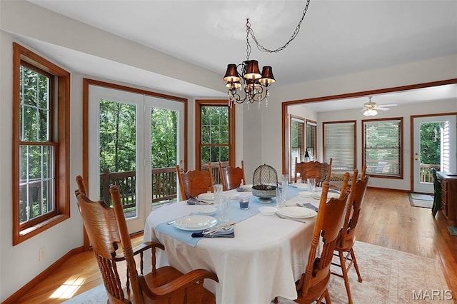 238 Skyway Dr, New Haven, MO 63068 - dining area with light wood-style flooring and a chandelier