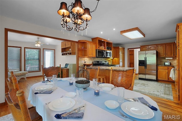 238 Skyway Dr, New Haven, MO 63068 - dining room featuring light wood finished floors, recessed lighting, and a chandelier
