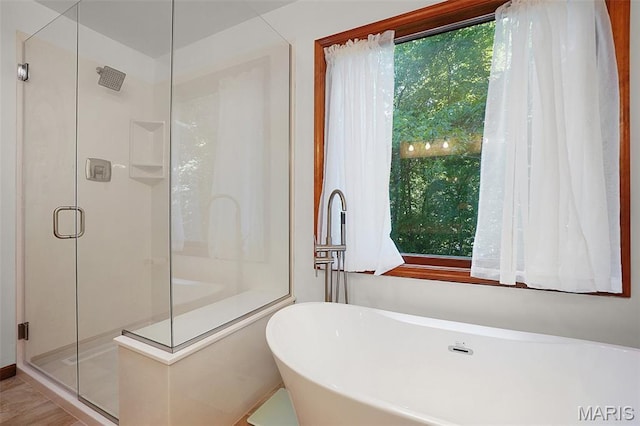 238 Skyway Dr, New Haven, MO 63068 - bathroom with plenty of natural light, a freestanding bath, and a shower stall