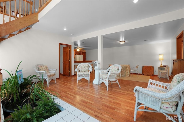 238 Skyway Dr, New Haven, MO 63068 - sitting room featuring ceiling fan, stairway, recessed lighting, and light wood-style floors