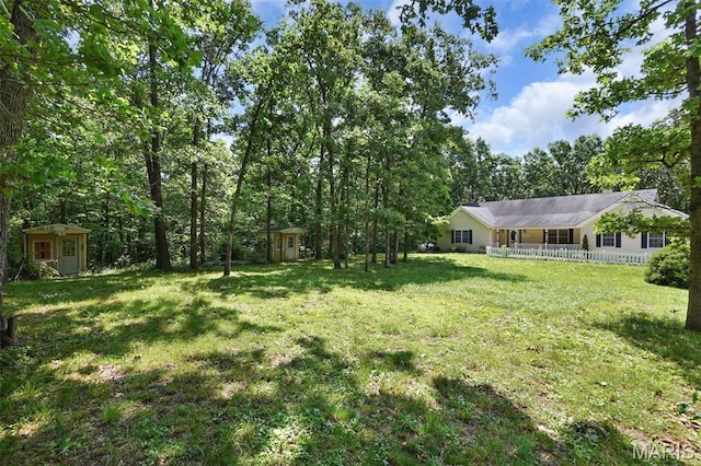 238 Skyway Dr, New Haven, MO 63068 - view of grassy yard featuring a shed