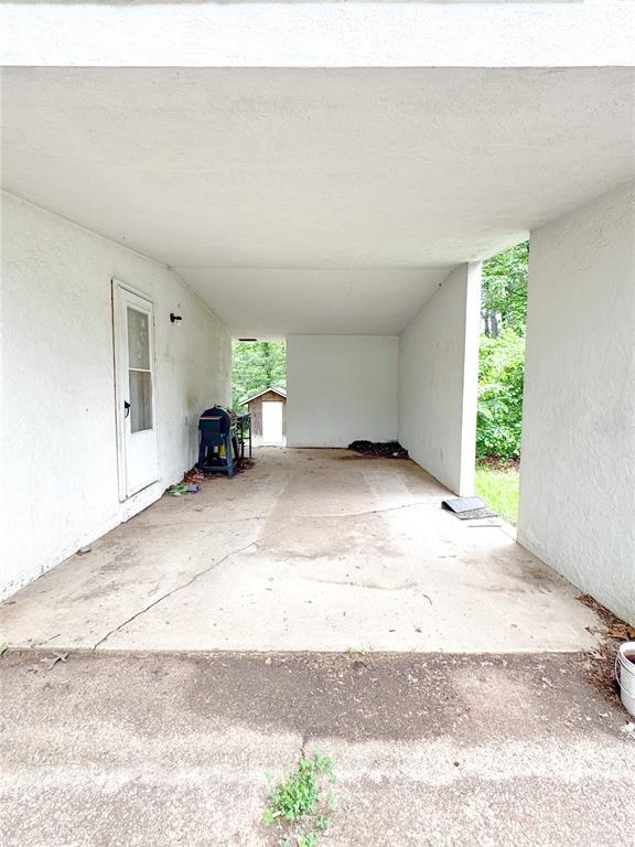 40 Walnut St, Viburnum, MO 65566 - view of car parking with a storage shed