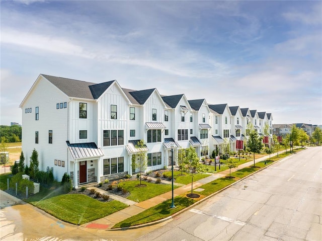 8919 E Gateway Hts Unit 94-804, Richmond Heights, MO 63144 - townhome / multi-family property with a residential view and a standing seam roof