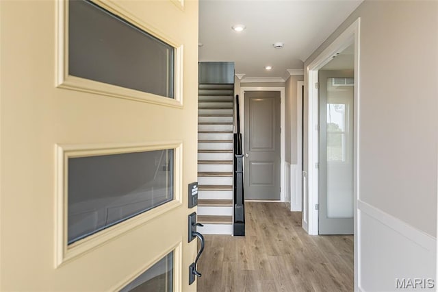 8919 E Gateway Hts Unit 94-804, Richmond Heights, MO 63144 - corridor with ornamental molding, light wood-style floors, a wainscoted wall, stairway, and recessed lighting