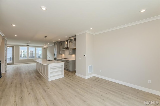 8919 E Gateway Hts Unit 94-804, Richmond Heights, MO 63144 - kitchen with ornamental molding, baseboards, a sink, open floor plan, and recessed lighting