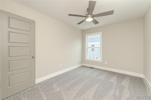 8919 E Gateway Hts Unit 94-804, Richmond Heights, MO 63144 - spare room featuring baseboards, carpet floors, and a ceiling fan