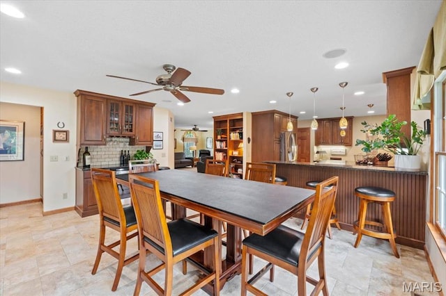 22 Fox Valley Ct, Lake St Louis, MO 63367 - dining space featuring ceiling fan, recessed lighting, and baseboards