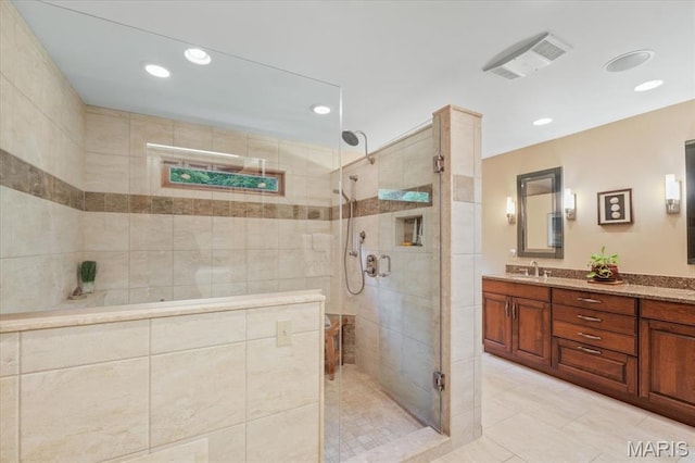 22 Fox Valley Ct, Lake St Louis, MO 63367 - full bathroom with double vanity, a stall shower, recessed lighting, and tile patterned floors