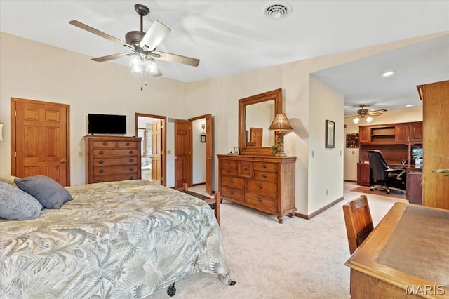 22 Fox Valley Ct, Lake St Louis, MO 63367 - bedroom with an office area, light carpet, ceiling fan, and baseboards