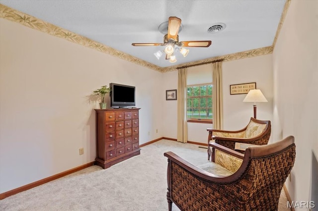 22 Fox Valley Ct, Lake St Louis, MO 63367 - living area with carpet floors, baseboards, and a ceiling fan