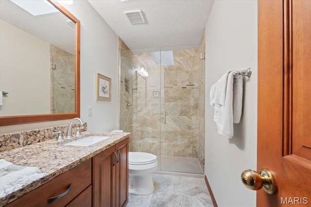 22 Fox Valley Ct, Lake St Louis, MO 63367 - full bathroom with a shower stall, vanity, toilet, baseboards, and a textured ceiling