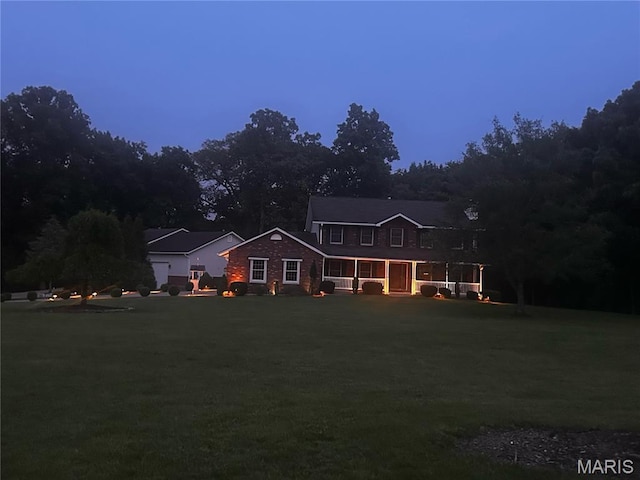 22 Fox Valley Ct, Lake St Louis, MO 63367 - back of house with a lawn