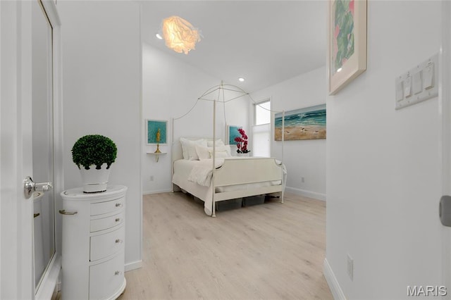 1021 Kilderkin Way, Saint Charles, MO 63301 - bedroom featuring light wood-type flooring, recessed lighting, and lofted ceiling