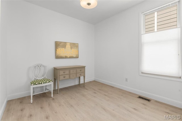 1021 Kilderkin Way, Saint Charles, MO 63301 - spare room with wood finished floors and baseboards