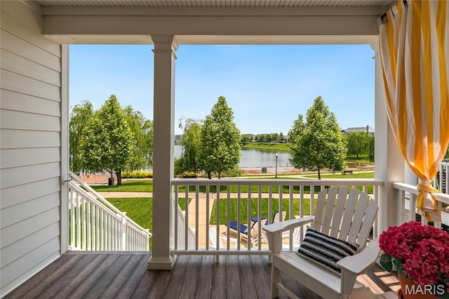 1021 Kilderkin Way, Saint Charles, MO 63301 - wooden porch featuring a water view and a lawn