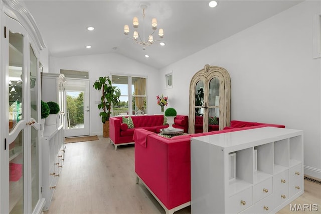 1021 Kilderkin Way, Saint Charles, MO 63301 - living area featuring vaulted ceiling, light wood-type flooring, a chandelier, and recessed lighting