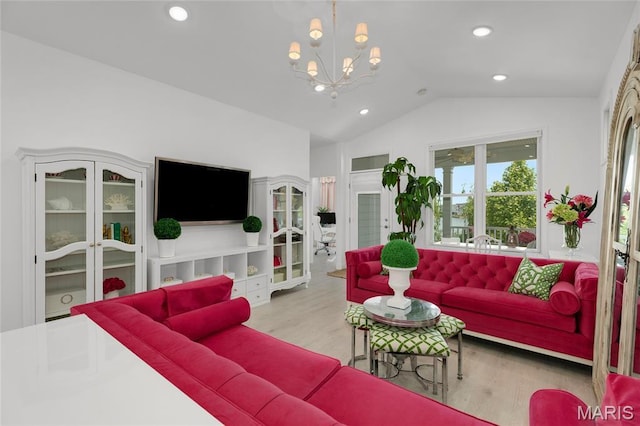 1021 Kilderkin Way, Saint Charles, MO 63301 - living area featuring vaulted ceiling, wood finished floors, a chandelier, and recessed lighting