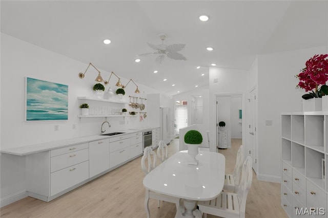 1021 Kilderkin Way, Saint Charles, MO 63301 - dining room featuring light wood-type flooring, lofted ceiling, a ceiling fan, and recessed lighting