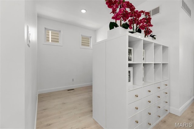1021 Kilderkin Way, Saint Charles, MO 63301 - detailed view of wood finished floors and recessed lighting