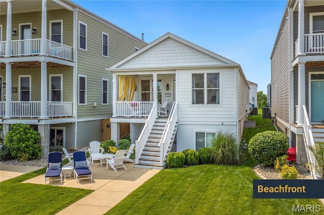 1021 Kilderkin Way, Saint Charles, MO 63301 - back of property featuring a yard, stairway, and a patio