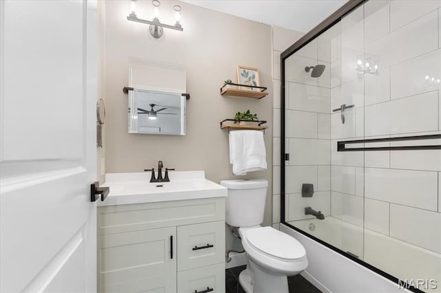 2774 Ashrock Dr, Saint Louis, MO 63129 - full bathroom featuring vanity, toilet, and shower / bath combination with glass door