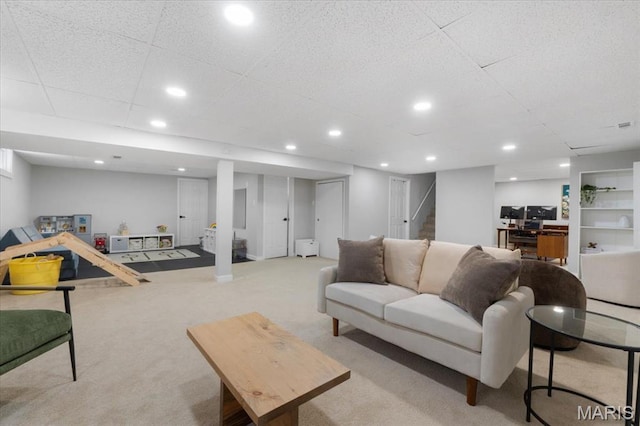 2774 Ashrock Dr, Saint Louis, MO 63129 - carpeted living area with stairway and recessed lighting