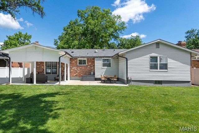 2774 Ashrock Dr, Saint Louis, MO 63129 - back of property featuring a patio, an outdoor living space, brick siding, and a chimney
