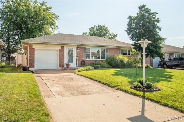 4319 Sinnwell Dr, Saint Louis, MO 63123 - single story home featuring a front lawn, an attached garage, driveway, and brick siding
