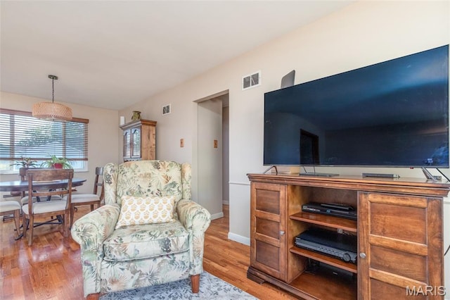 4319 Sinnwell Dr, Saint Louis, MO 63123 - sitting room featuring wood finished floors and baseboards