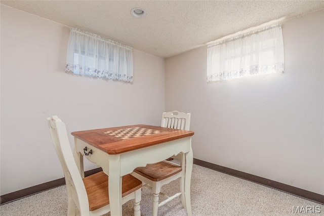 4319 Sinnwell Dr, Saint Louis, MO 63123 - dining room featuring baseboards and a textured ceiling