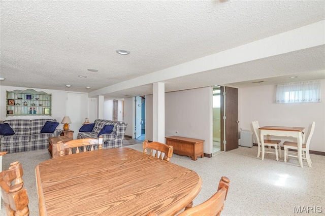 4319 Sinnwell Dr, Saint Louis, MO 63123 - dining room featuring a textured ceiling and baseboards