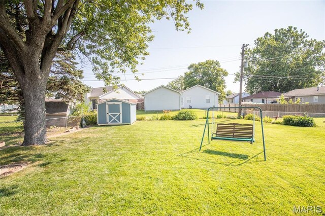 4319 Sinnwell Dr, Saint Louis, MO 63123 - fenced backyard featuring a storage unit