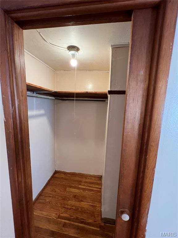 10052 Valley Dr, Riverview, MO 63137 - walk in closet with wood finished floors