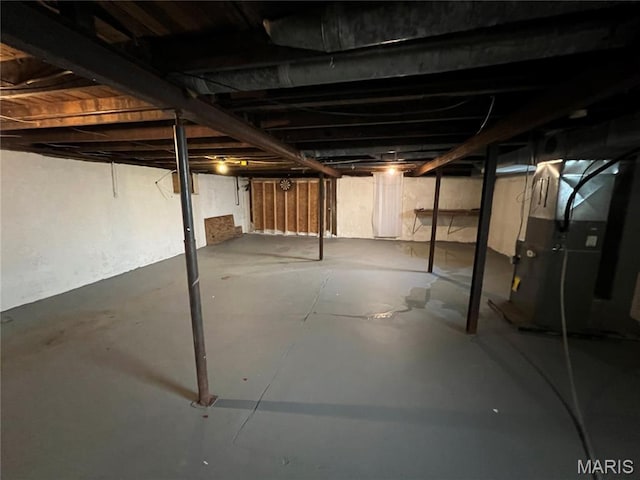10052 Valley Dr, Riverview, MO 63137 - unfinished below grade area with heating unit