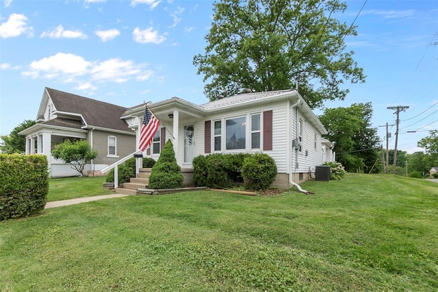 1545 N Main St, Cape Girardeau, MO 63701 - view of front of house with a front yard and central air condition unit