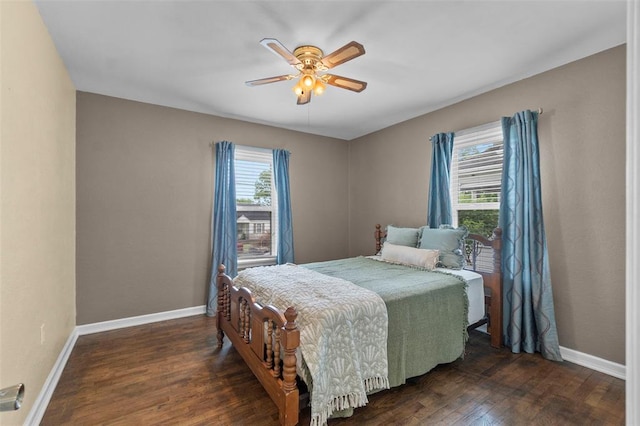 1545 N Main St, Cape Girardeau, MO 63701 - bedroom with baseboards, wood finished floors, and a ceiling fan