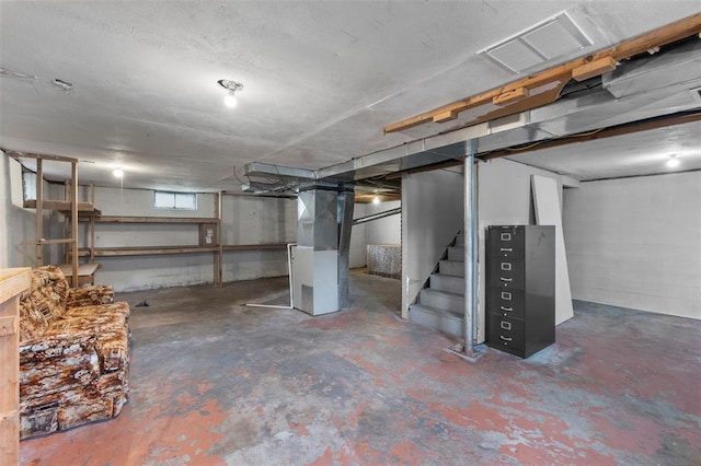 1545 N Main St, Cape Girardeau, MO 63701 - basement featuring stairs and heating unit