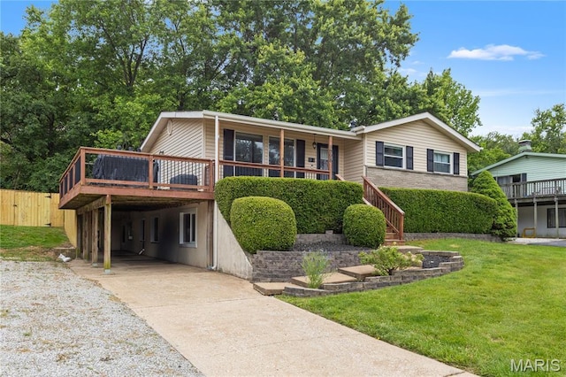 1998 Ridgeway Dr, Arnold, MO 63010 - view of front facade with driveway, a carport, and a wooden deck