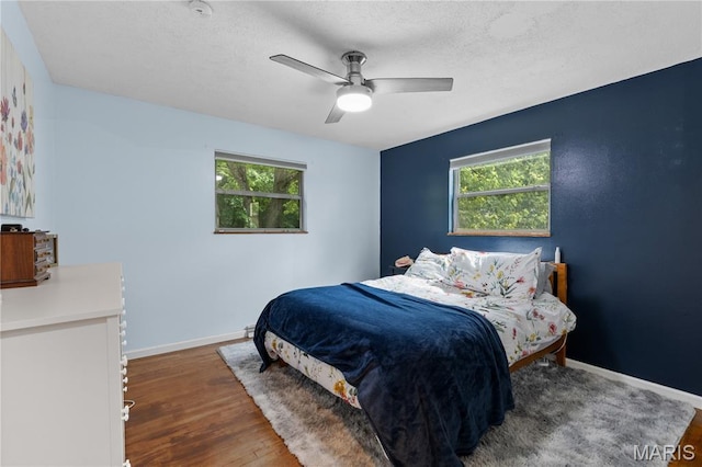 1998 Ridgeway Dr, Arnold, MO 63010 - bedroom with multiple windows, baseboards, and wood finished floors