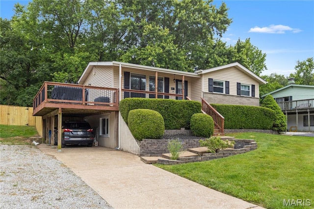 1998 Ridgeway Dr, Arnold, MO 63010 - view of front of house with a carport, concrete driveway, and a deck