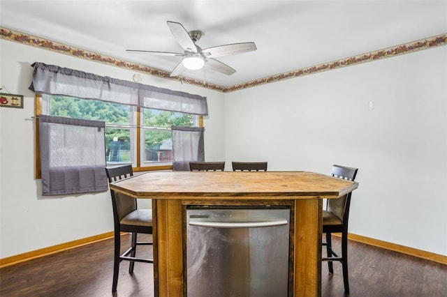 1961 E Union Ave, Litchfield, IL 62056 - dining room featuring baseboards, dark wood-style flooring, and a ceiling fan