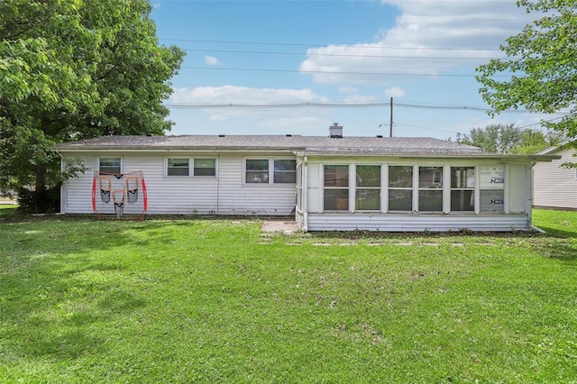 1961 E Union Ave, Litchfield, IL 62056 - back of house featuring a yard and a sunroom