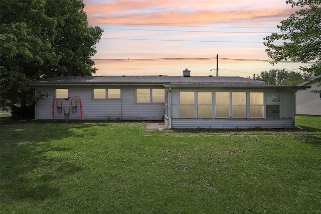 1961 E Union Ave, Litchfield, IL 62056 - back of house featuring a lawn
