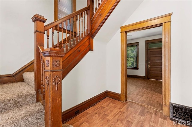 207 Voss Pl, Belleville, IL 62220 - staircase with wood finished floors and baseboards