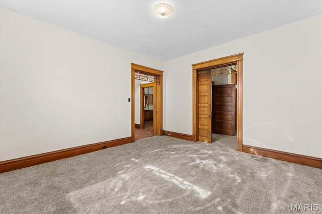 207 Voss Pl, Belleville, IL 62220 - unfurnished bedroom with baseboards, carpet floors, and a closet