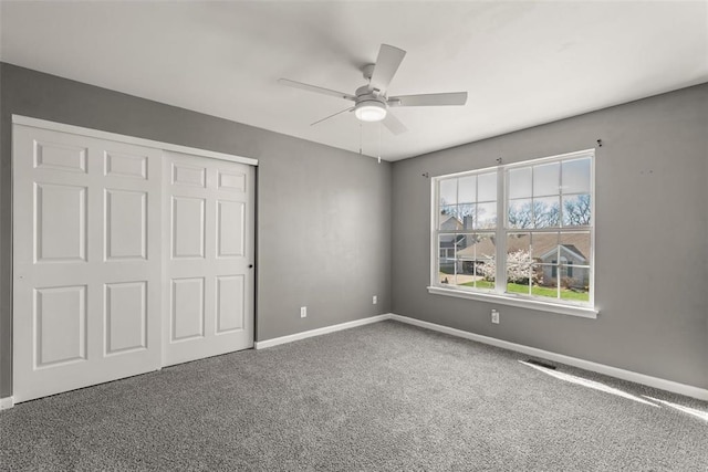 122 Tennessee Walker Way, Saint Peters, MO 63376 - unfurnished bedroom with carpet flooring, a closet, baseboards, and a ceiling fan