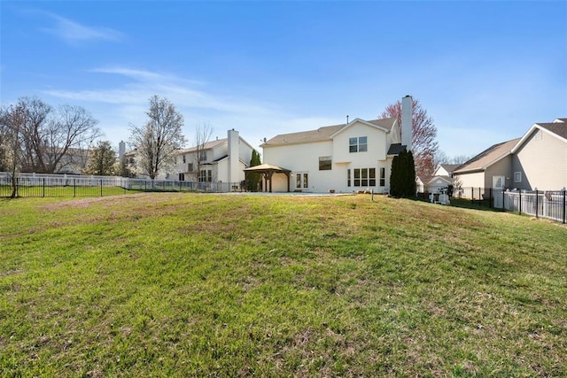 122 Tennessee Walker Way, Saint Peters, MO 63376 - back of property with a gazebo and a chimney